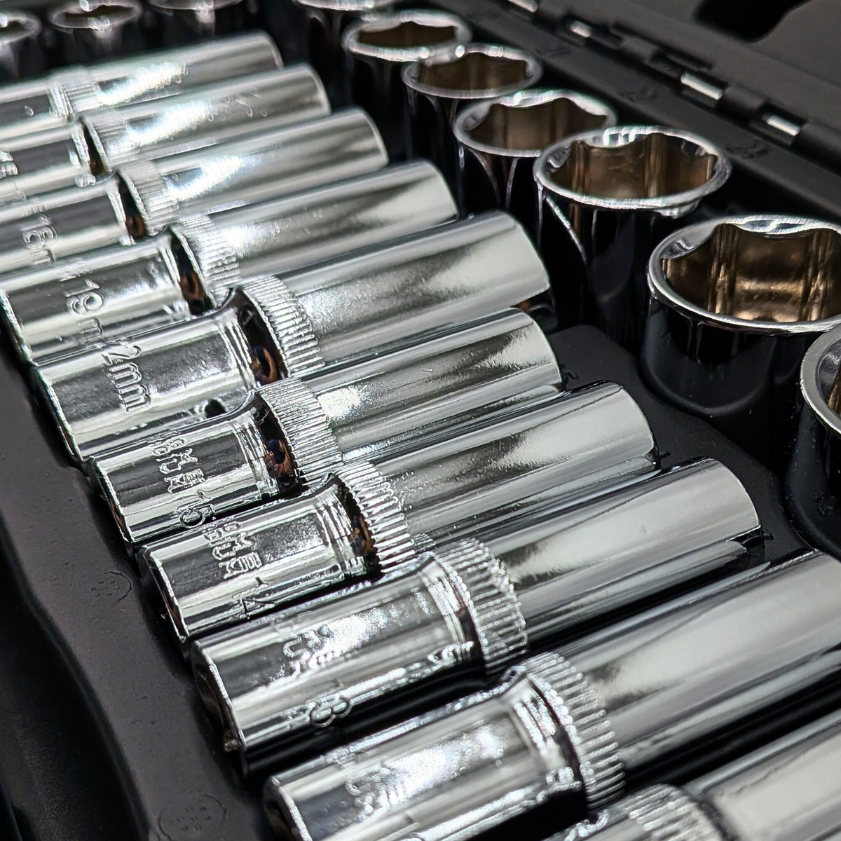 Close-up of deep and standard chrome sockets in the IRONVOLT 218-piece tool case.